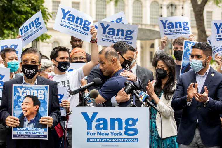 Image: State Sen. John Liu hugs Andrew Yang at a campaign rally in New York on May 24, 2021.
