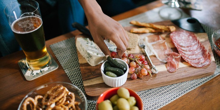 This charcuterie board and cheese knife set is my go-to party platter. Shop the CTFT Cheese Board and other charcuterie boards perfect for post-vaccine reunions.