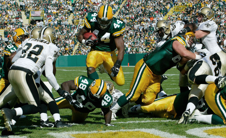 Image: Green Bay Packers running back Najeh Davenport (44) scores against the New Orleans Saints at Lambeau Field in Green Bay, Wisc., on Oct. 9, 2005.
