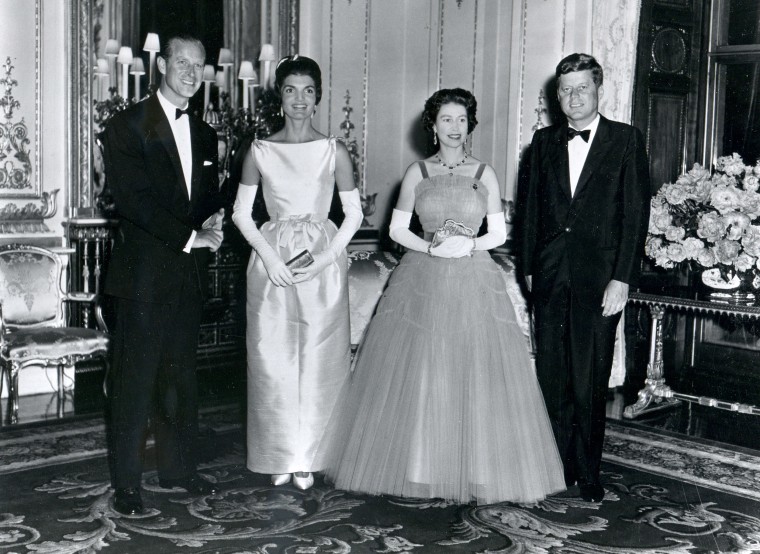 President John F. Kennedy and his wife, first lady Jacqueline Kennedy, with Queen Elizabeth II  and her husband, Prince Philip, Duke of Edinburgh, attend a banquet at Buckingham Palace in London, United Kingdom, June 15, 1961.