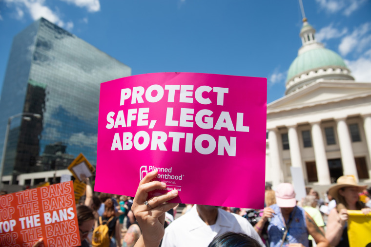 Abortion rights protesters rally in support of Planned Parenthood near the Old Courthouse in St. Louis, Mo., on May 30, 2019.