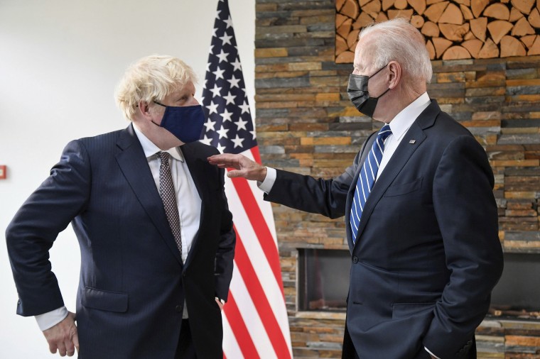 Image: Biden, right, talks with Johnson on Thursday ahead of the summit