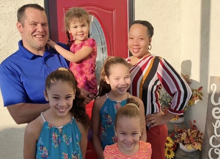 Rachel Nix with her husband and their four daughters.