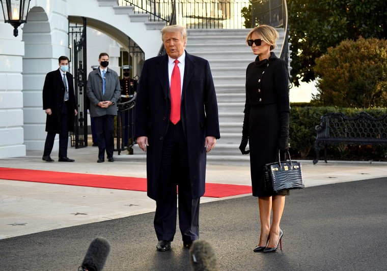 Outgoing President Donald Trump and First Lady Melania Trump talk to the press as they depart the White House on Jan. 20, 2021.