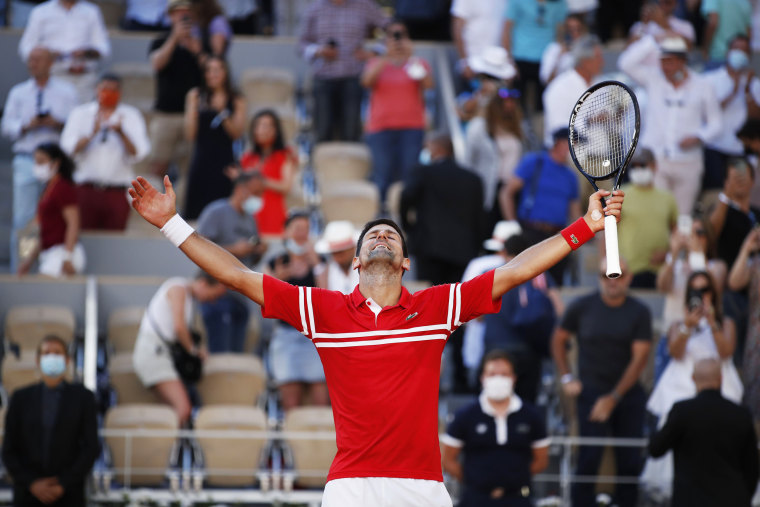 Serbia's Novak Djokovic celebrates winning the French Open against Greece's Stefanos Tsitsipas on June 13, 2021.