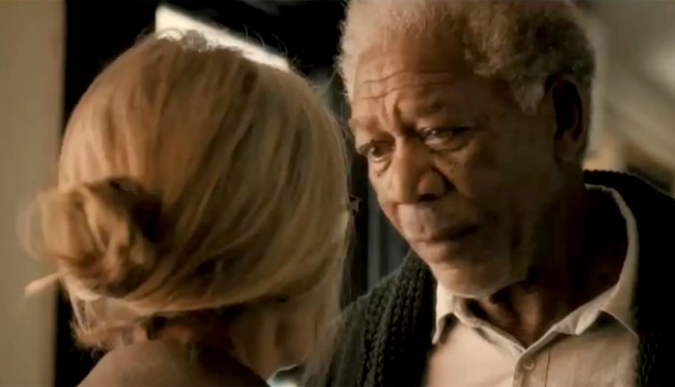 Keaton with Morgan Freeman, about to share a pillowy kiss in "5 Flights Up."