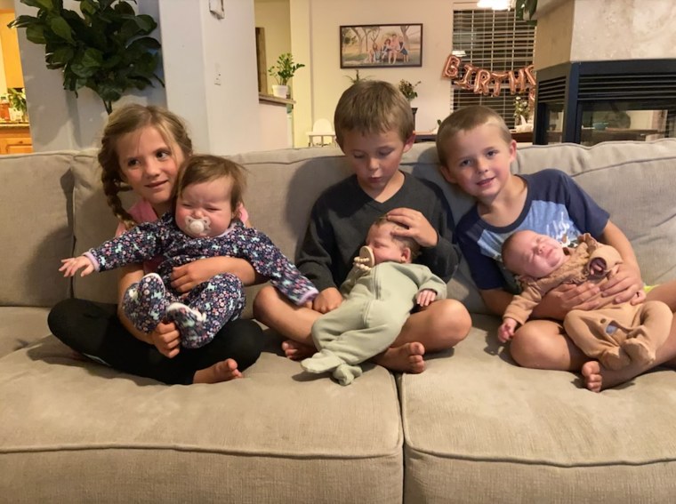 Desiree and Ryan Fortin's children, Charlize, Sawyer and Jax, 5, and Cambria, 8 months, with Aly and JR Dakin's twins, Goldie and Jasper, 4 months.