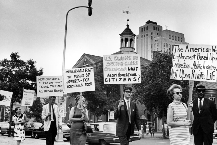  In this July 4, 1967, photo, Kay Tobin Lahusen, right, and other demonstrators carry signs calling for protection of homosexuals from discrimination as they march in a picket line in front of Independence Hall in Philadelphia.