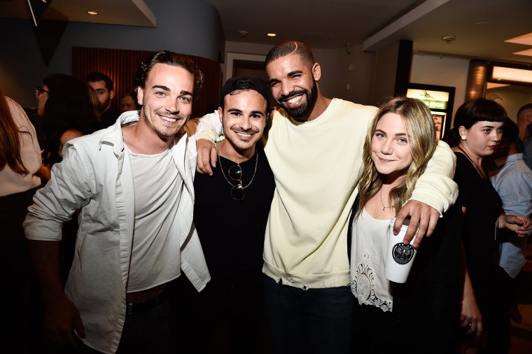 Daniel Clark with "Degrassi" co-stars Adamo Ruggiero, Drake, and Lauren Collins