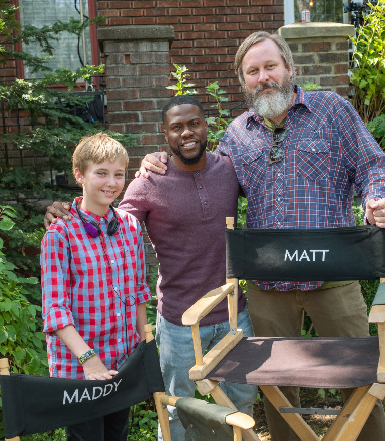 Author Matt Logelin and his daughter Maddy pose for a photo on the set of "Fatherhood" with actor Kevin Hart.