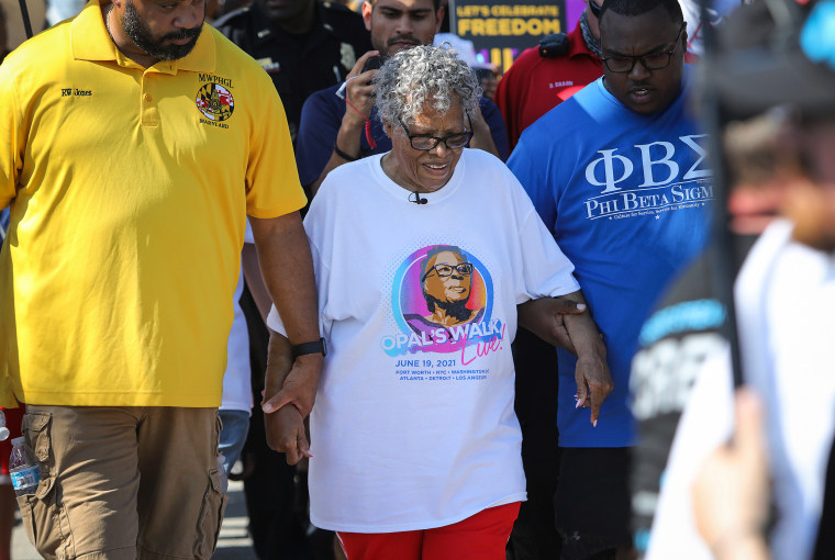 Opal Lee, 94, walks towards downtown Fort Worth, Texas from Evans Avenue Plaza