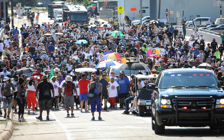 The crowd as Opal Lee walks toward downtown Fort Worth, Texas.