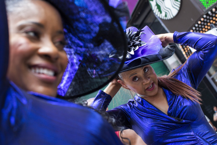 Women wait to perform during a free outdoor event organized by The Broadway League during Juneteenth celebrations at Times Square on Saturday, June 19, 2021.