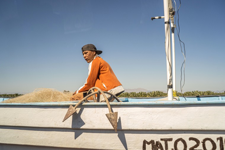 Image: A fisherman from the Cucapa indigenous people, during preparations to sail, in El Zanjon, Baja California, April 2021.