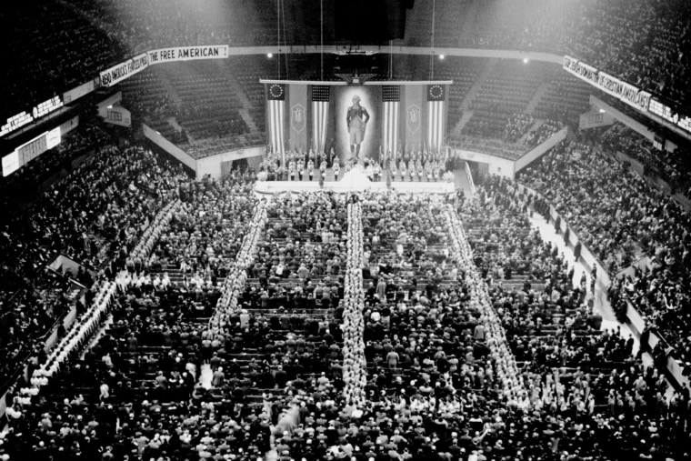 Nazi storm troopers fill the aisles as the crowd sings \"The Star Spangled Banner\" at the opening of the German-American Bund's \"Americanization Rally\" at Madison Square Garden on Feb. 20, 1939.