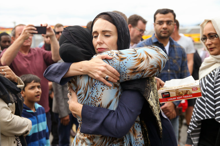 Image: Prime Minister Jacinda Ardern hugs a mosque-goer at the Kilbirnie Mosque on March 17, 2019 in Wellington, New Zealand.