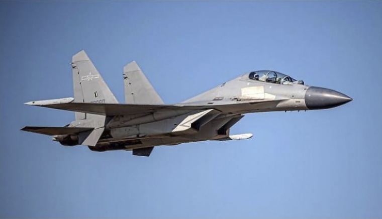 Image: A Chinese PLA J-16 fighter jet flies in an undisclosed location