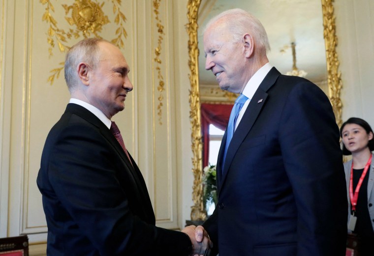 Image: Russian President Vladimir Putin shakes hands with President Joe Biden during their meeting at the 'Villa la Grange' in Geneva, Switzerland,