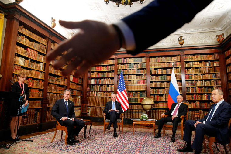 A security officer indicates to the media to step back as Secretary of State Antony Blinken, US President Joe Biden, Russia's President Vladimir Putin and Russia's Foreign Minister Sergei Lavrov meet in Geneva on June 16, 2021.