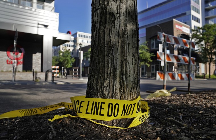 Discarded police tape lays outside a Target, on June 14, 2021, in Uptown Minneapolis.