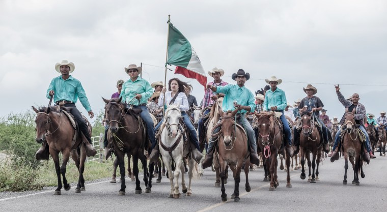 Image:  A cabalgada, Spanish for cavalcade, during the Dia de los Negros or Juneteenth celebration in the village of Nacimiento de los Negros, Mexico, in 2015.