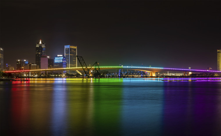 The Acosta Bridge is illuminated with rainbow lighting in honor of Pride Month on June 7, 2021, in downtown Jacksonville, Fla.