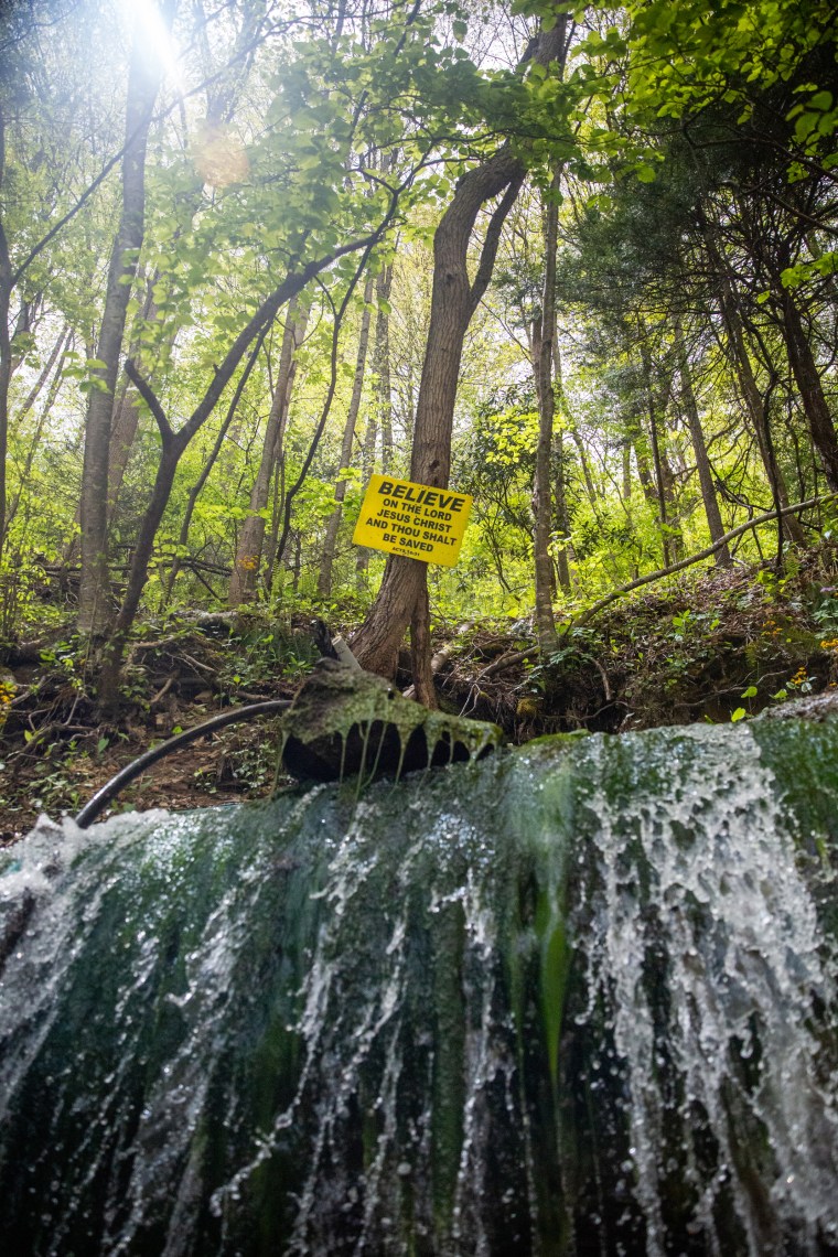 Water cascades from a roadside spring in McDowell County, W.Va.