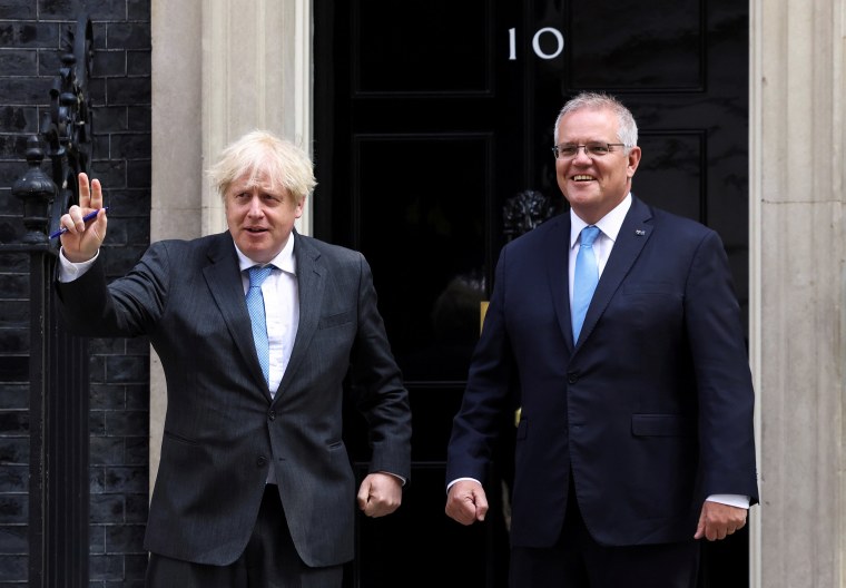 Image: British Prime Minister Boris Johnson gestures as he meets with his Australian counterpart Scott Morrison at Downing Street in London, Britain
