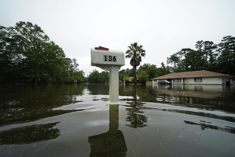 Water from Tropical Storm Claudette floods a neighborhood after the storm passed through Slidell, La., on June 19, 2021.