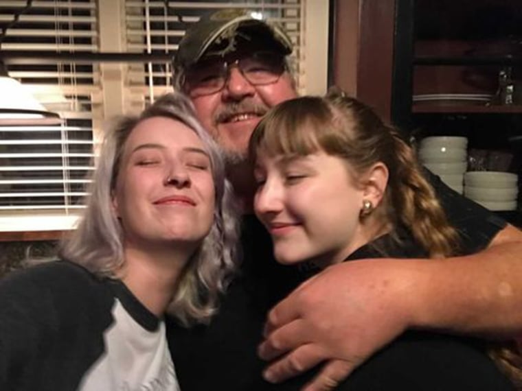 Anna Harp, 27, and Abrielle Clausing, 21, of Arkansas with their dad, Rudolph Clausing.
