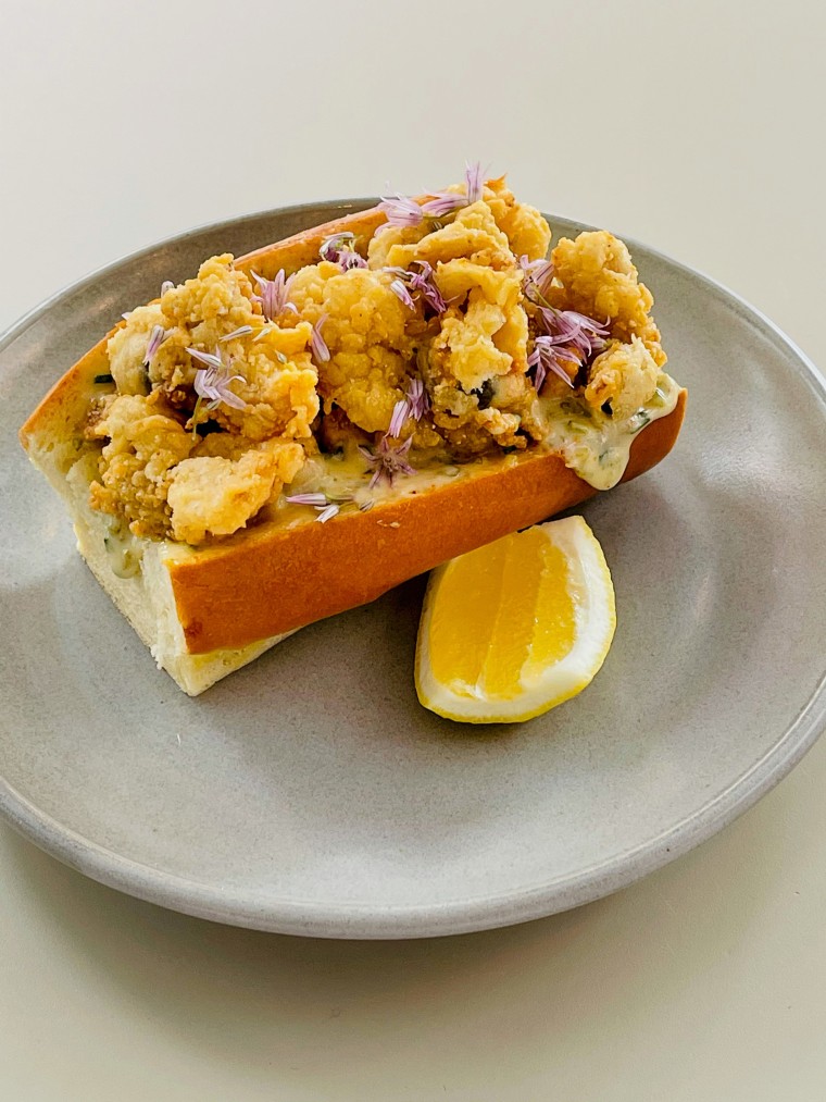 Musket Room in Manhattan serves a clam roll with pickle brine aioli.