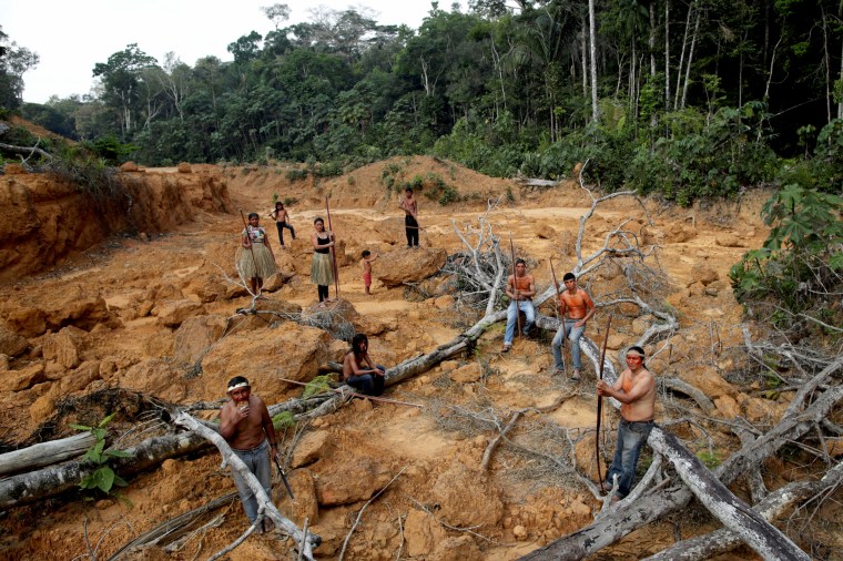 Image: Indigenous members of the Mura tribe in a deforested area on unmarked indigenous lands inside the Amazon rainforest on Aug. 20, 2019.