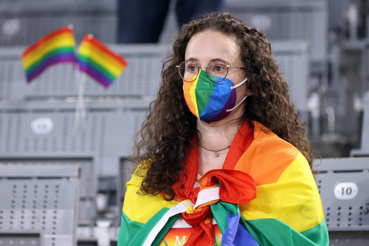 Image: A German fan wearing a rainbow face covering in the stands before the match against Hungary.