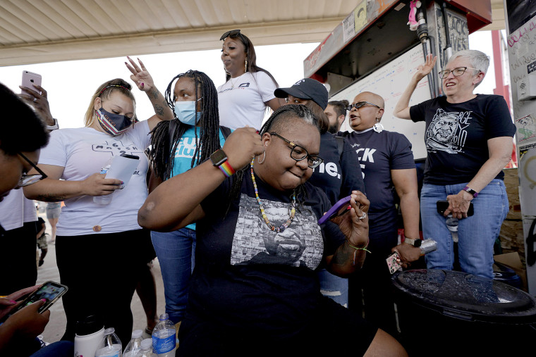 Image: Jennifer Starr Dodd and other supporters react as a sentence of 22 1/2 years in prison for the murder of George Floyd is announced.