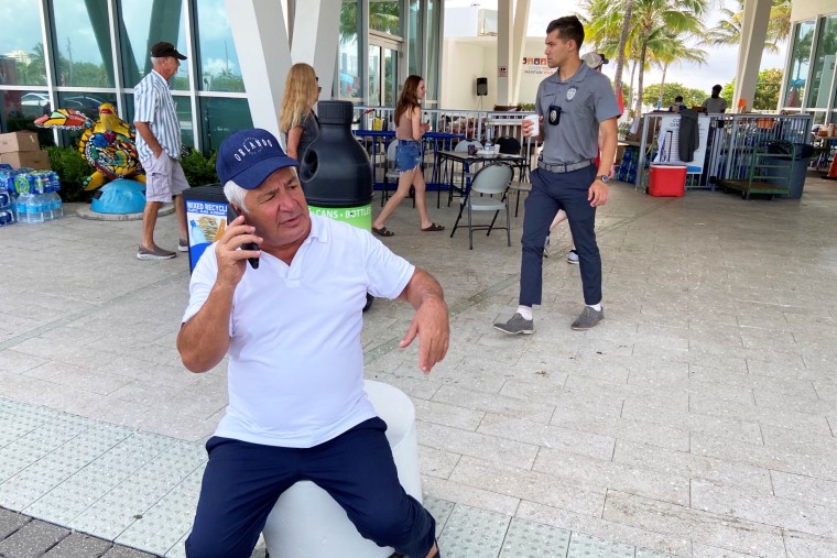 Moshe Candiotti, 67, sits outside the Surfside community center contemplating his next move. He escaped the building collapse but now must repair his life.