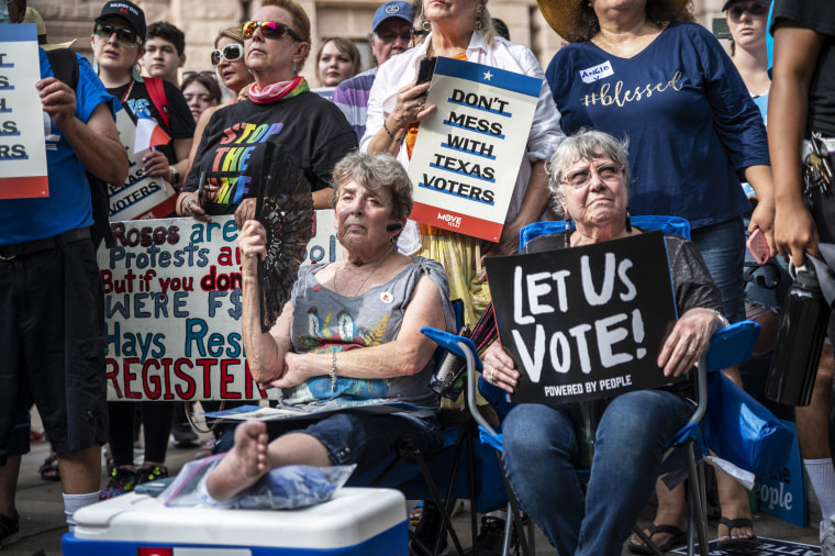 People rally at the state Capitol to protest a bill that would place tougher restrictions on voting on June 20, 2021, in Austin, Texas.