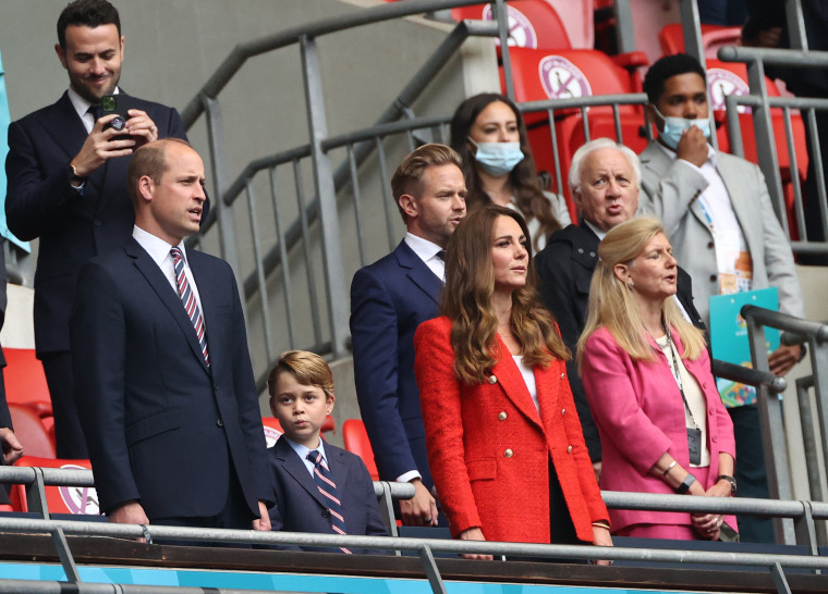 Prince William And Prince George Wear Suits And Soccer Game