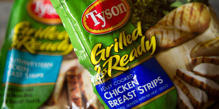 Packages of Tyson Foods Inc. chicken breast strips are arranged for a photograph.