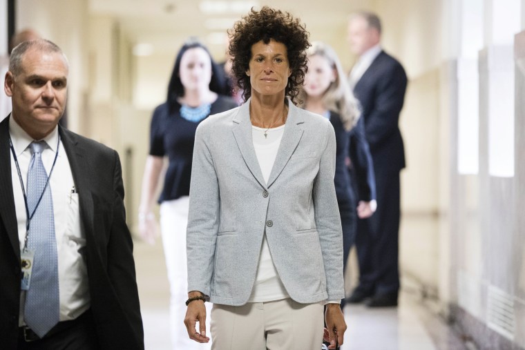 Image: Andrea Constand walks to the courtroom during Bill Cosby's sexual assault trial