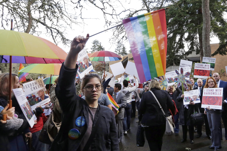 Image: Supporters on both sides of the case line a walkway following a hearing before Washington's Supreme Court about a florist, Barronelle Stutzman, who was sued for refusing to provide services for a same sex-wedding on Nov. 15, 2016, in Bellevue, Wash