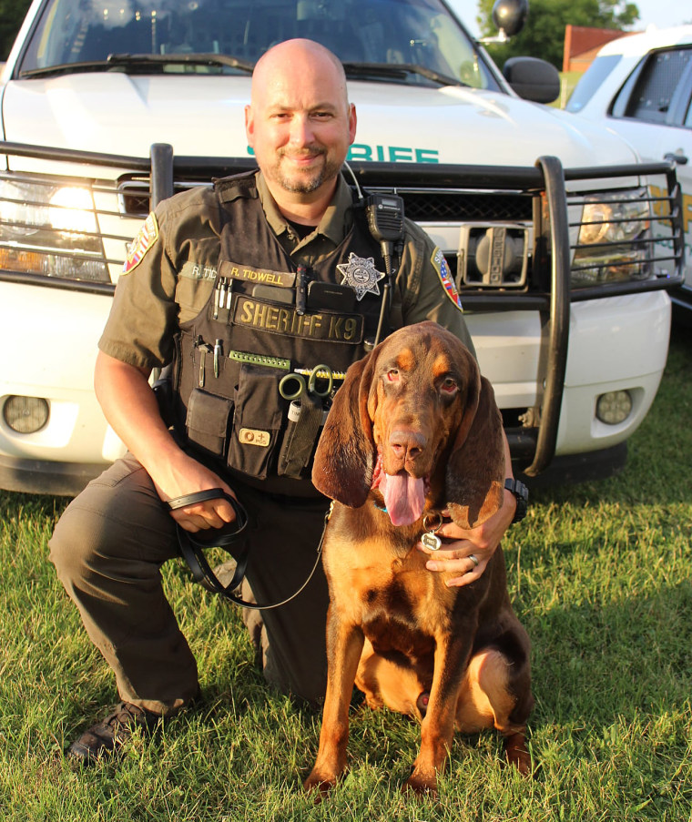 Image: Rutherford County K-9 Deputy Richard Tidwell and bloodhound Fred.