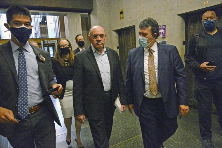 Allen Weisselberg, second from left, Donald Trump's long-serving chief financial officer, surrenders Thursday morning, July 1, 2021, at the lower Manhattan building that houses the criminal courts and the district attorney's office. (Jefferson Siegel/The
