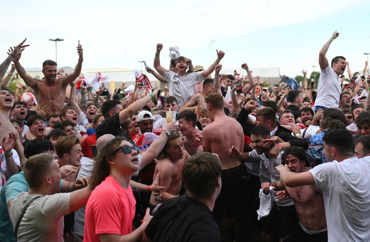 Image: England supporters react to England's win against Germany at the 4TheFans Fan Park in Manchester