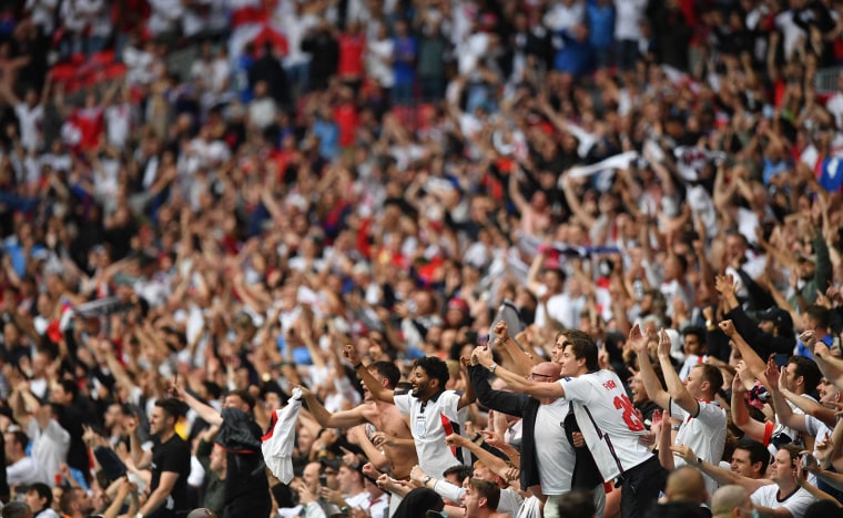 Image: England supporters celebrate their win in the UEFA EURO 2020 round of 16 football match between England and Germany at Wembley Stadium