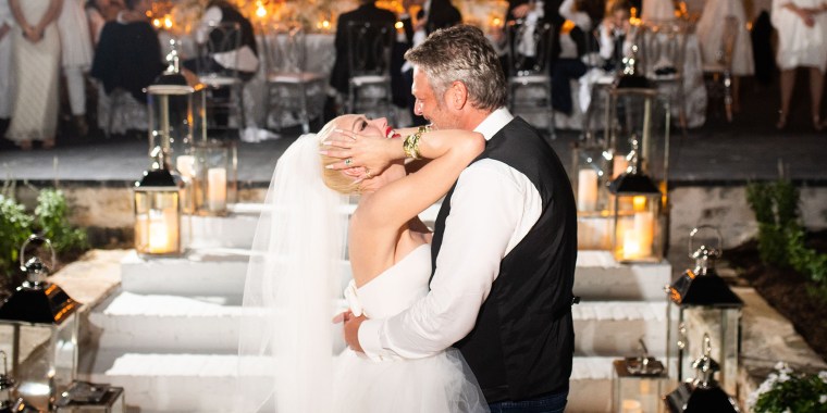 The newlyweds share a sweet moment at their reception.