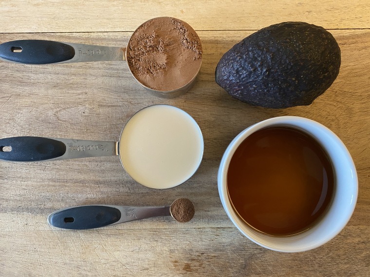 You only need four ingredients for this recipe: an avocado, maple syrup, cocoa powder and unsweetened nut milk (and maybe a little cinnamon or cayenne).
