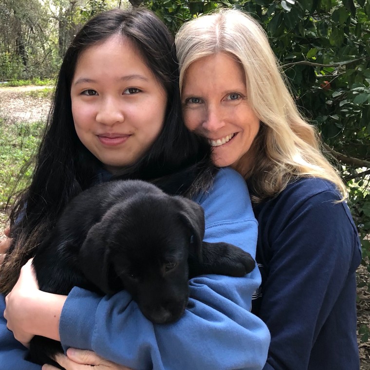 Stacy Clark with her adopted daughter, Hanna.