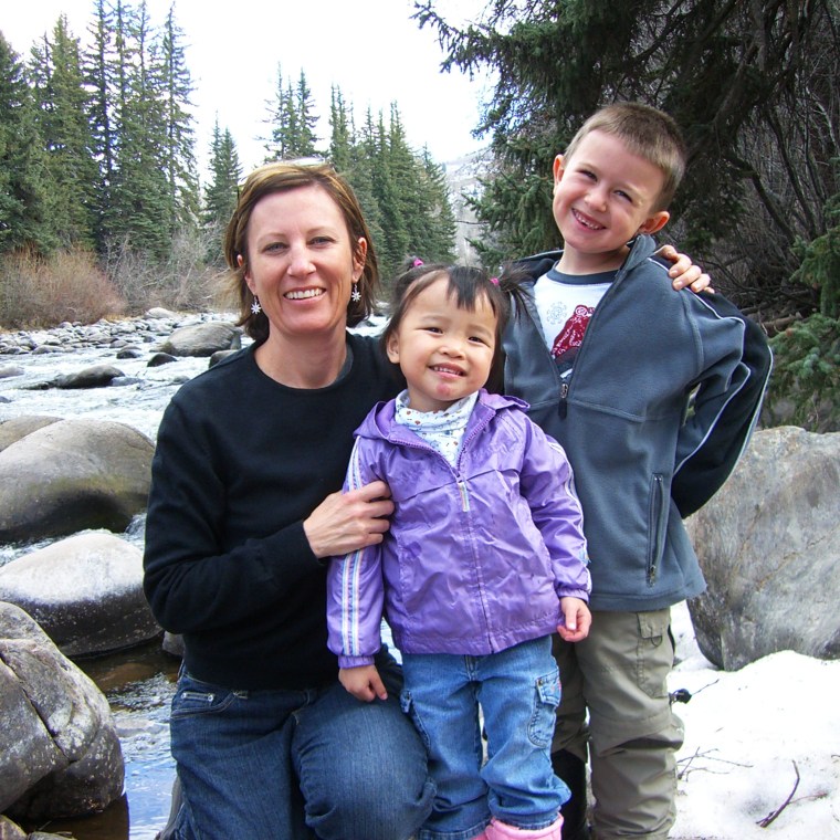 Jayne Alfieri with her biological son, Jack, and her adopted daughter, Emili.