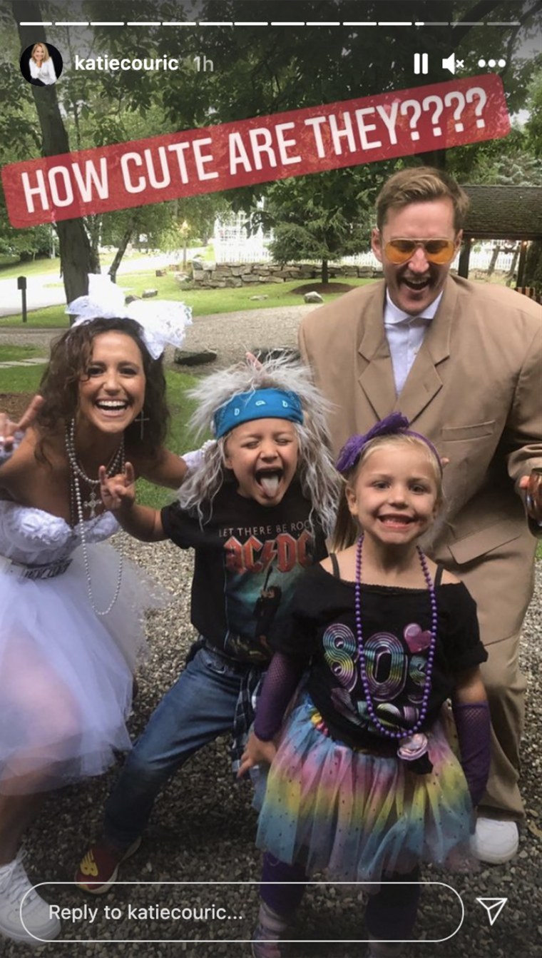 Couric's daughter, Ellie Monahan and her groom-to-be, Mark Dobrosky, posed with costumed kids at the party, which took place during their wedding weekend.