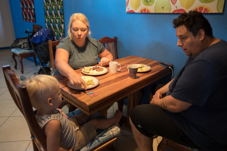 Jeromy and Kelsey work on teaching Emmett numbers at their Airbnb in Costa Rica.